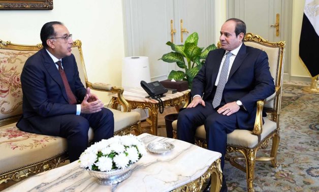 FILE - Egypt's President Sisi meets with Prime Minister Mostafa Madbouli