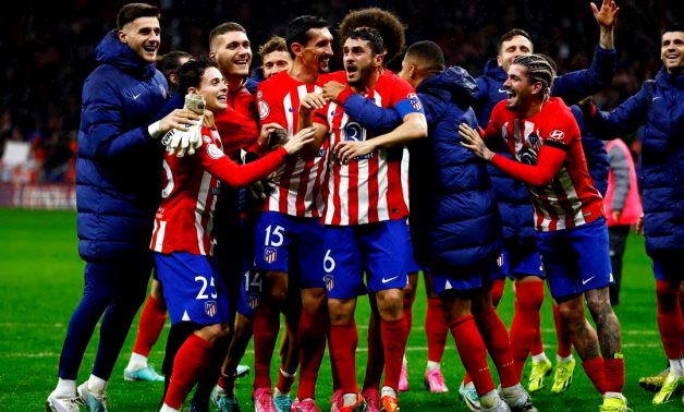 Atletico Madrid players celebrate after the match REUTERS/Susana Vera