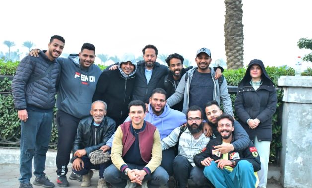 File: Essam Omar along with the cast of "El Bahes An Manfaz Khroug El Sayed Rambo" 