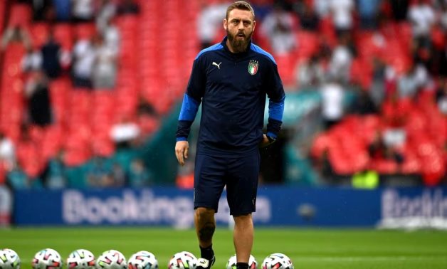 Italy assistant coach Daniele De Rossi before the match Pool via REUTERS/Andy Rain/File Photo