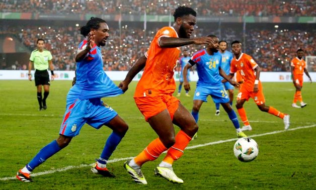 Ivory Coast's Franck Kessie in action with DR Congo's Samuel Moutoussamy REUTERS/Luc Gnago