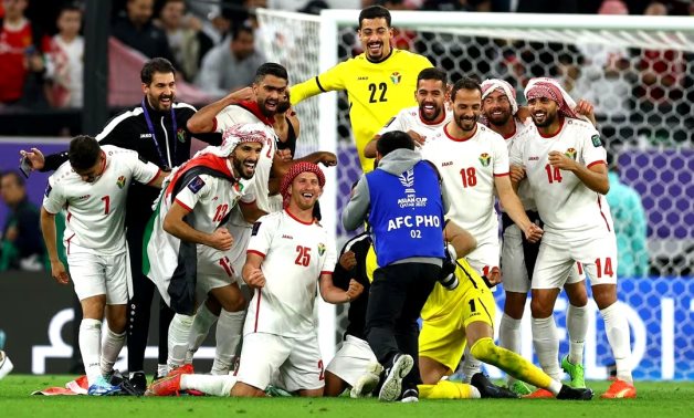Jordan players celebrate after reaching the AFC Asian Cup final REUTERS/Molly Darlington/File Photo