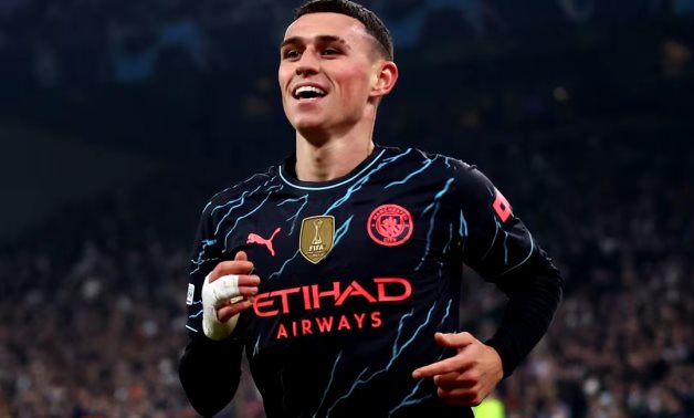 Manchester City's Phil Foden celebrates scoring their third goal Action Images via Reuters/Matthew Childs/ File Photo