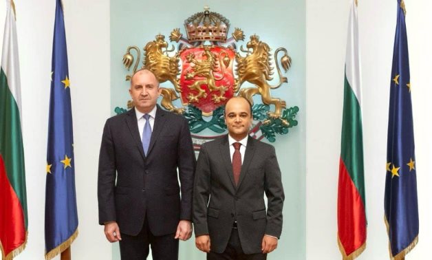 Bulgaria President Rumen Radev and Ambassador Nader Saad pose for a picture- press photo
