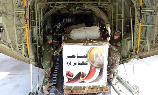 FILE - Egyptian jet airdropping aid to Gaza Strip