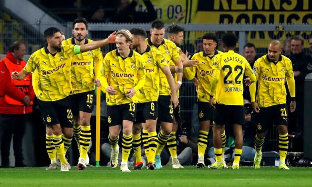 Borussia Dortmund's Jadon Sancho celebrates scoring their first goal with teammates REUTERS/Thilo Schmuelgen/File Photo