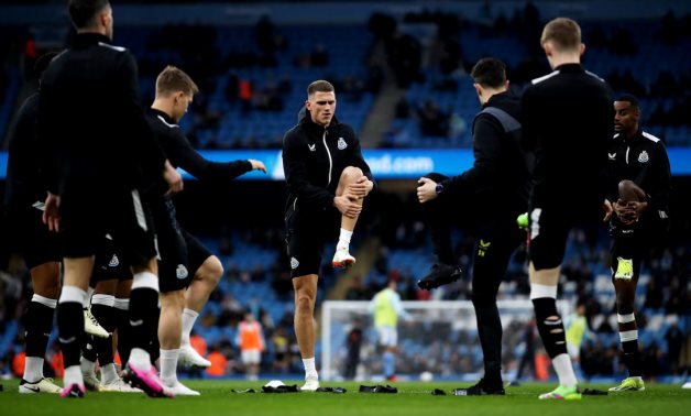 Newcastle United's Sven Botman and teammates during the warm up before the match REUTERS/Chris Radburn