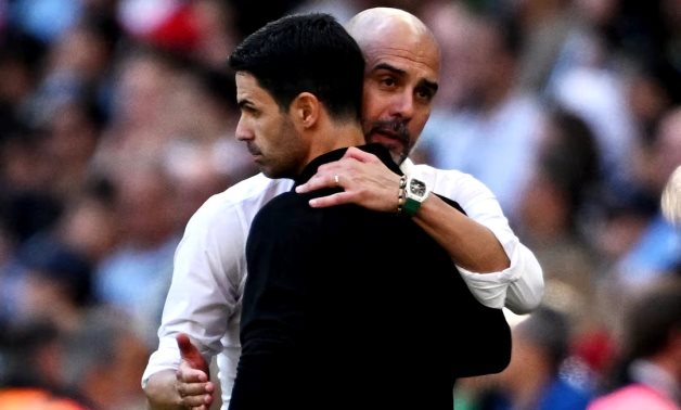 Manchester City manager Pep Guardiola with Arsenal manager Mikel Arteta at full time REUTERS/Dylan Martinez/File Photo