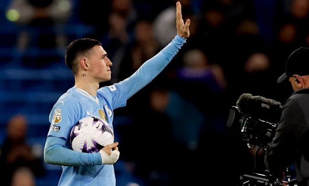 Manchester City's Phil Foden celebrates with the match ball after the match Action Images via Reuters/Jason Cairnduff
