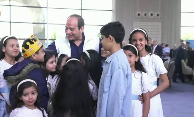 President Sisi greets children of martyrs of police and armed forces during Eid celebrations Wednesday 