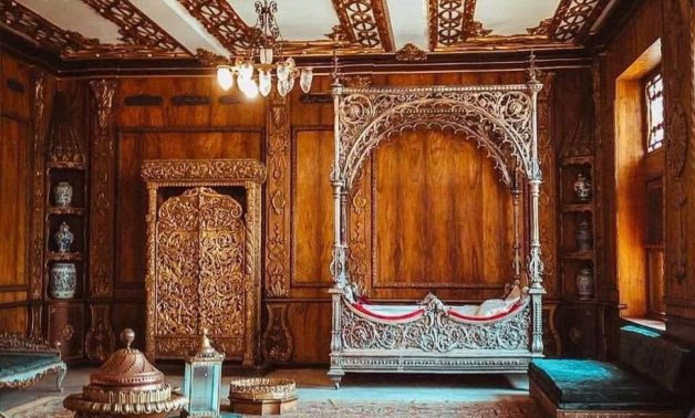 A photo from inside the Manial Palace Museum in Cairo of the royal bed of Amina Hanem Elhamy - Press photo