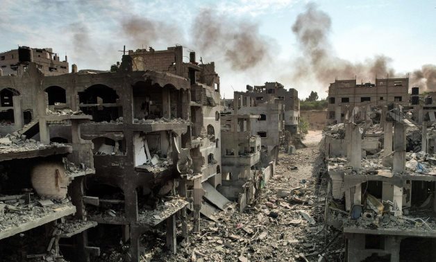 A file photo of destruction in Gaza due to Israeli strikes - WAFA