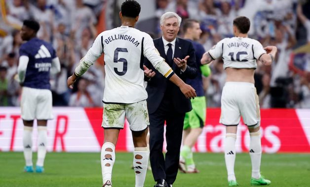 Real Madrid coach Carlo Ancelotti and Jude Bellingham celebrate after the match REUTERS/Juan Medina