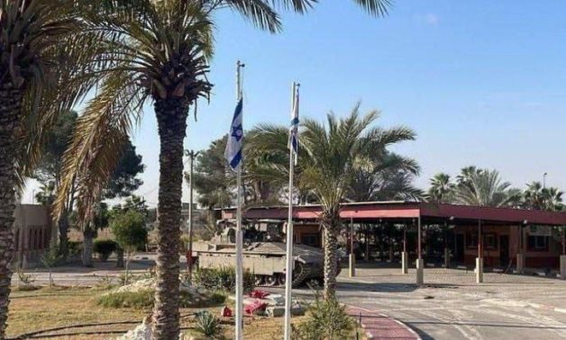Israel installed its flags on the Palestinian side of Rafah Border Crossing during military operation on town