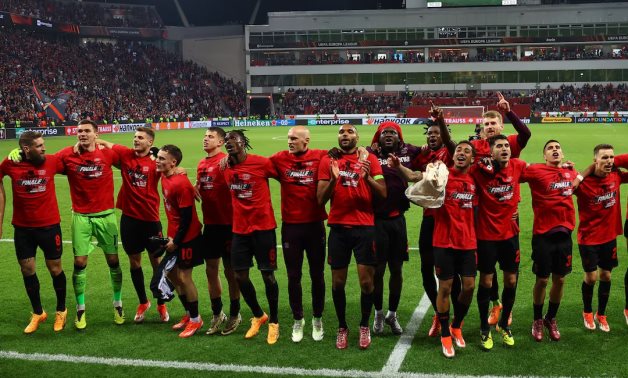 Bayer Leverkusen players celebrate after the match REUTERS/Kai Pfaffenbach