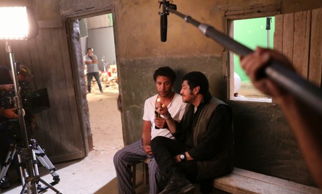 Mohamed Emam and Bassem Samra from behind the scenes of El Leb Ma’aa El Eyal.
