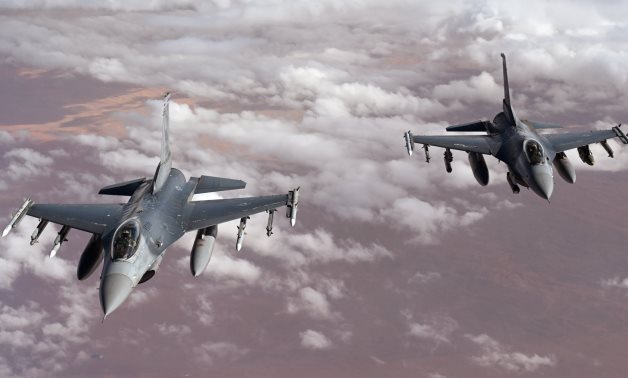 Two US Air Force F-16 Fighting Falcons patrol the US Central Command area of responsibility – FILE/CENTCOM