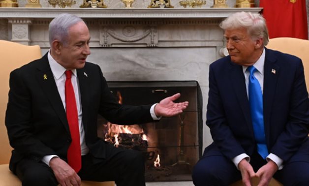 Israeli Prime Minister Benjamin Netanyahu speaks with US President Donald Trump at the White House - US GPO