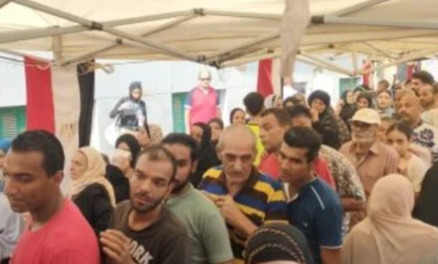 File- Long queues of voters line up outside polling stations to vote in Egypt's2025 Senate elections
