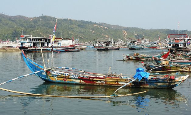 FILE – A fishing boat at Corokok fishing village, boarding point to Cubadak Island, West Sumatra, Indonesia. Flickr/Fabio Achilli