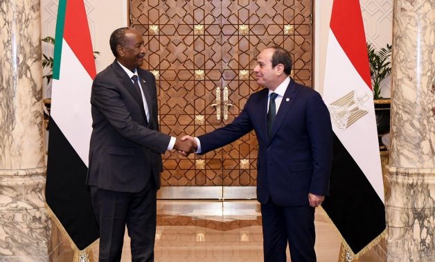 Egyptian President Abdel Fattah El-Sisi receives Sudanese Transitional Council Chairman Abdel Fattah Al-Burhan in Cairo, 18 Dec. 2025. Egyptian Presidency