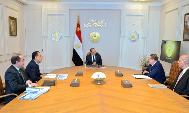 Egypt's President Abdel Fattah El-Sisi meets with Prime Minister Mostafa Madbouly, Central Bank of Egypt (CBE) Governor Hassan Abdalla, and Finance Minister Ahmed Kouchouk. Presidency