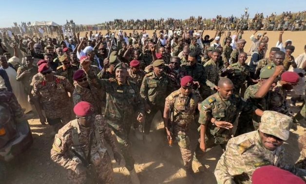 FILE - Sudanese Sovereignty Council Chief Gen. Abdel Fattah al-Burhan inspects frontlines in the Al-Batana area, reviewing the combat readiness of stationed forces. Sudanese Armed Forces