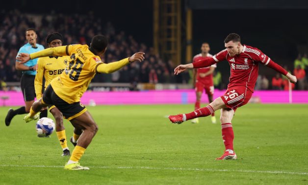 Liverpool's Andy Robertson scores their first goal REUTERS/Chris Radburn