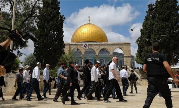 Settlers storm Al-Aqsa Mosque under the protection of Israeli police. WAFA