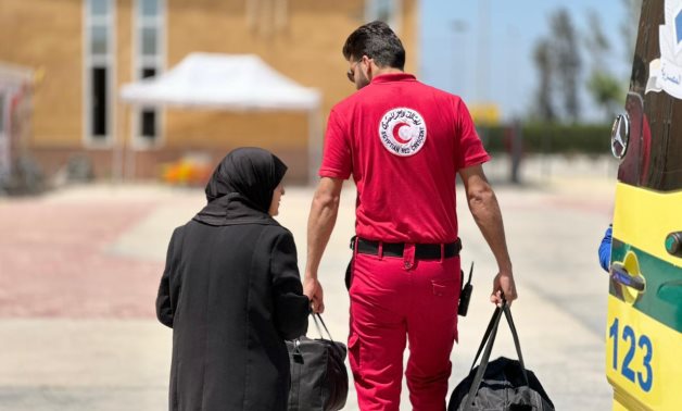 The Egyptian Red Crescent receives the 37th group of wounded and ill Palestinians from Gaza through the Rafah border crossing. ERC
