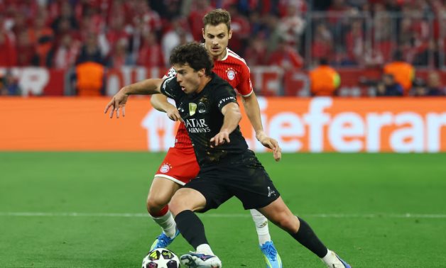 Paris St Germain's Joao Neves in action with Bayern Munich's Josip Stanisic REUTERS/Kai Pfaffenbach 