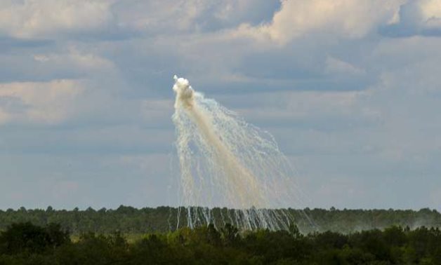 A white phosphorus munition explodes in the air above targets during an exercise for the US Army's 3rd Combat Aviation Brigade at Fort Stewart in 2016. Photo: Spc. Scott Lindblom, 3rd CAB Public Affairs