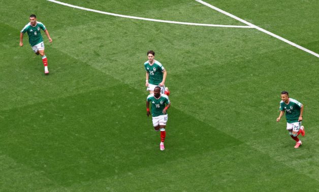 Mexico's Julian Quinones celebrates scoring their first goal with Brian Gutierrez, Roberto Alvarado and Erik Lira REUTERS/Raquel Cunha