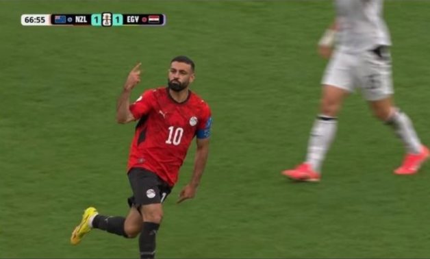 Mo Salah celebrating scoring goal 