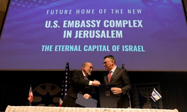 Israeli FM Gideon Sa'ar (R) and US Amb. to Israel Mike Huckabee signed an agreement to allocate the site for the permanent building of the US Embassy in Jerusalem. Sa’ar’s X account
