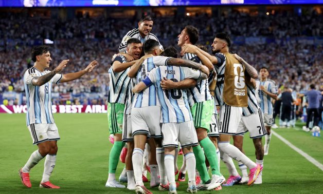 Argentina's Cristian Romero celebrates scoring their third goal with teammates REUTERS/Paul Childs