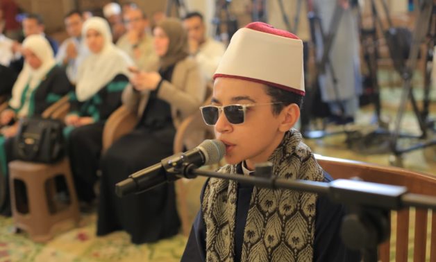 Young boy among contestants in the Dawlet el-Telawa Program for Quranic Recitation