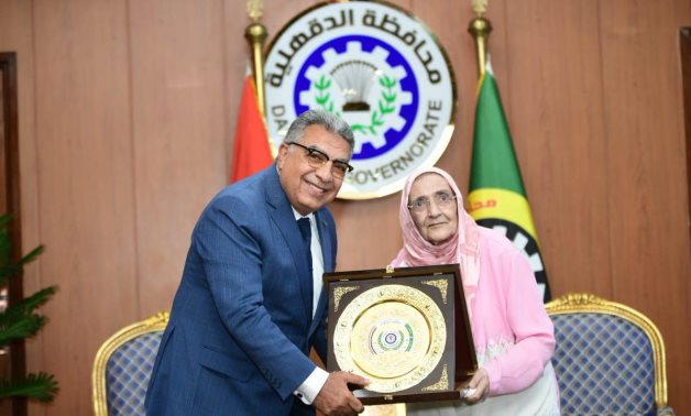 Dakahlia Governor Major General Tariq Marzouq met with 83-year-old Egyptian Amal Ismail Metwally Abdo on July 6 to honor her after she obtained  PhD in sociology - press photo