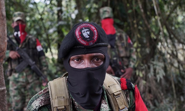 Yerson, commander of the National Liberation Army (ELN), talks to Reuters in the northwestern jungles in Colombia, August 30, 2017. Picture taken August 30, 2017. REUTERS/Federico Rios