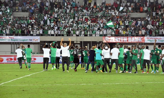 Nigerian national team celebrating their victory – Press image courtesy Reuters
