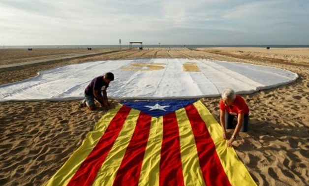 © AFP / by Daniel SILVA | The Catalan government has called an independence referendum on October 1 in defiance of Madrid