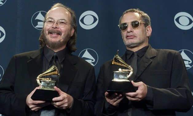 This 2001 file photo shows Walter Becker (L) and Donald Fagen of Steely Dan posing with their Grammy Awards for Best Pop Vocal Album at the 43rd Annual Grammy Awards in Los Angeles-AFP/File / VINCE BUCCI
