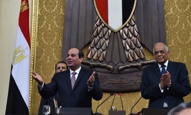  President Abdel Fatah al-Sisi (L) and Parliament Speaker Ali Abdel Aal (R)- AFP