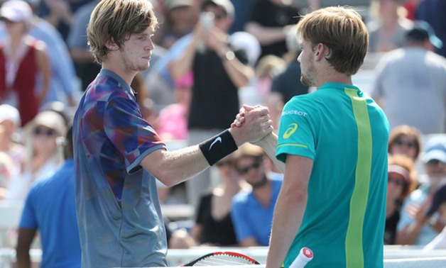 Andrey Rublev of Russia (left) shakes hands with David Goffin of Belgium – Press image Reuters