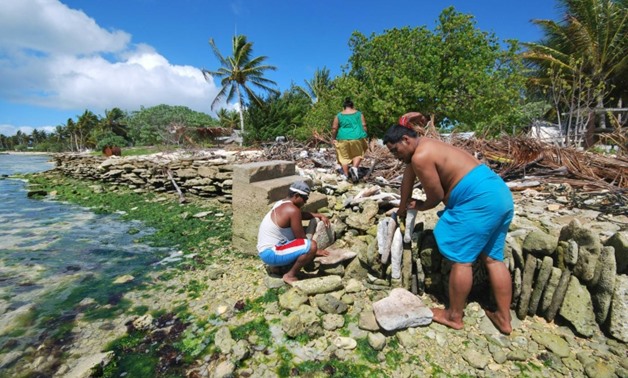 The 18-member Pacific Islands Forum includes countries such as Kiribati, which are only metres above sea level and risk being swamped by rising oceans-SPC/AFP/File / -