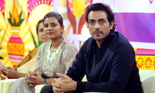 Bollywood actor Arjun Rampal (R) and actress Aishwarya Rajesh (L) star in the biopic 'Daddy' which depicts the life of notorious Mumbai mafia don Arun Gawli-AFP/File / STR