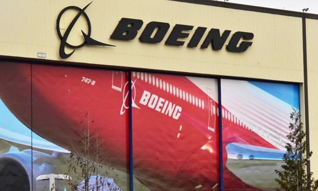 China to spend over $1 trillion on planes over next 20 years: Boeing. Reuters Staff. 2 Min Read. Boeing Co's logo is seen above the front door
