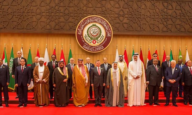 Caption Arab leaders and head of delegations pose for a group photograph during the 28th Ordinary Summit of the Arab League at the Dead Sea, Jordan March 29, 2017- Reuters