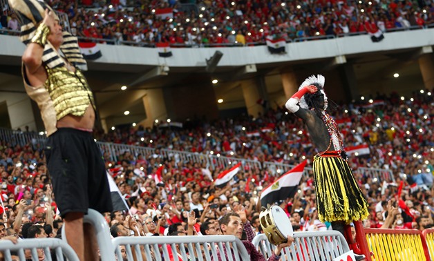 Egyptian fans in match against Uganda, Reuters