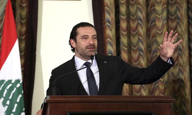 Lebanon's Prime Minister Saad al-Hariri gestures as he talks at the governmental palace in Beirut - REUTERS